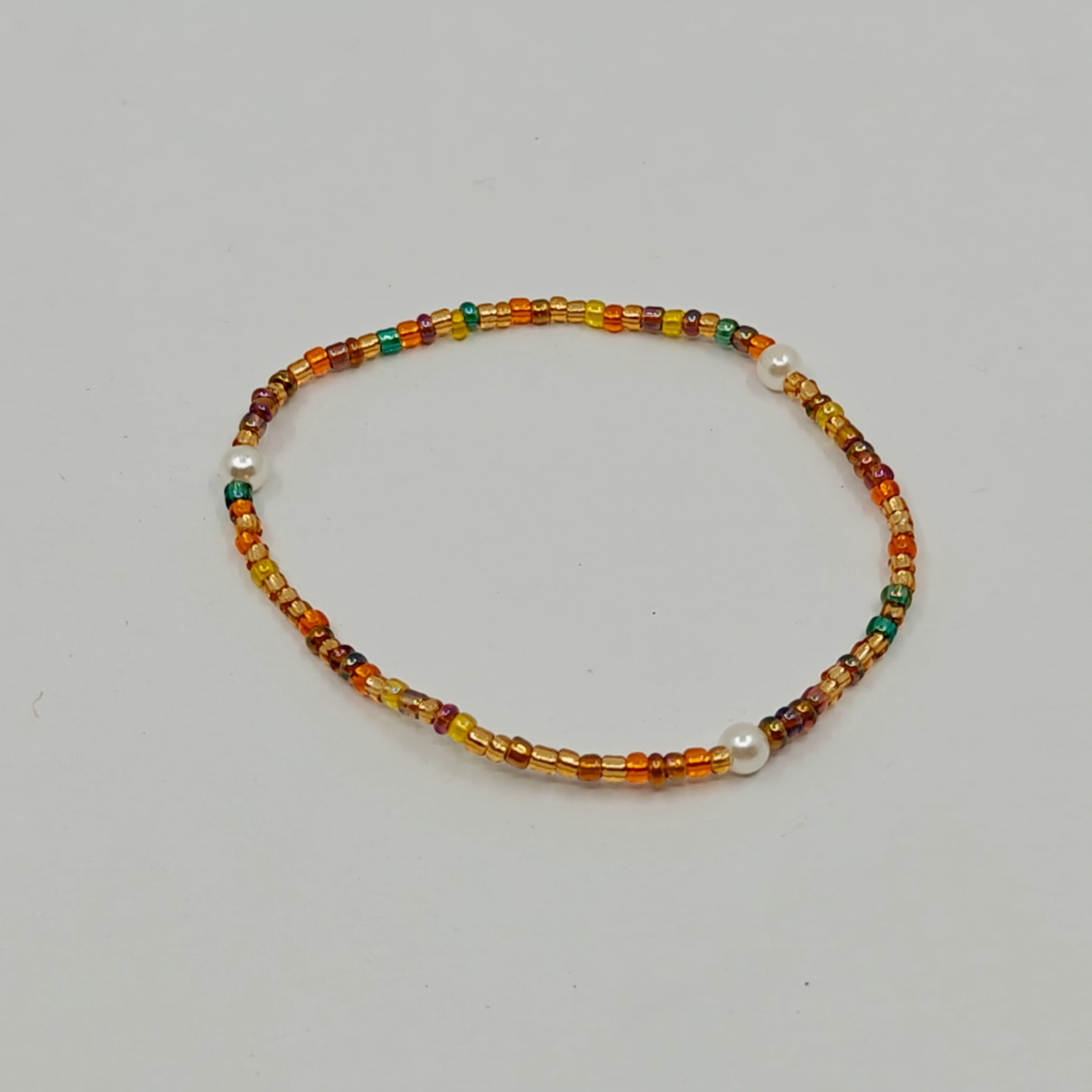 Picture of the bracelet laying flat on a white surface 